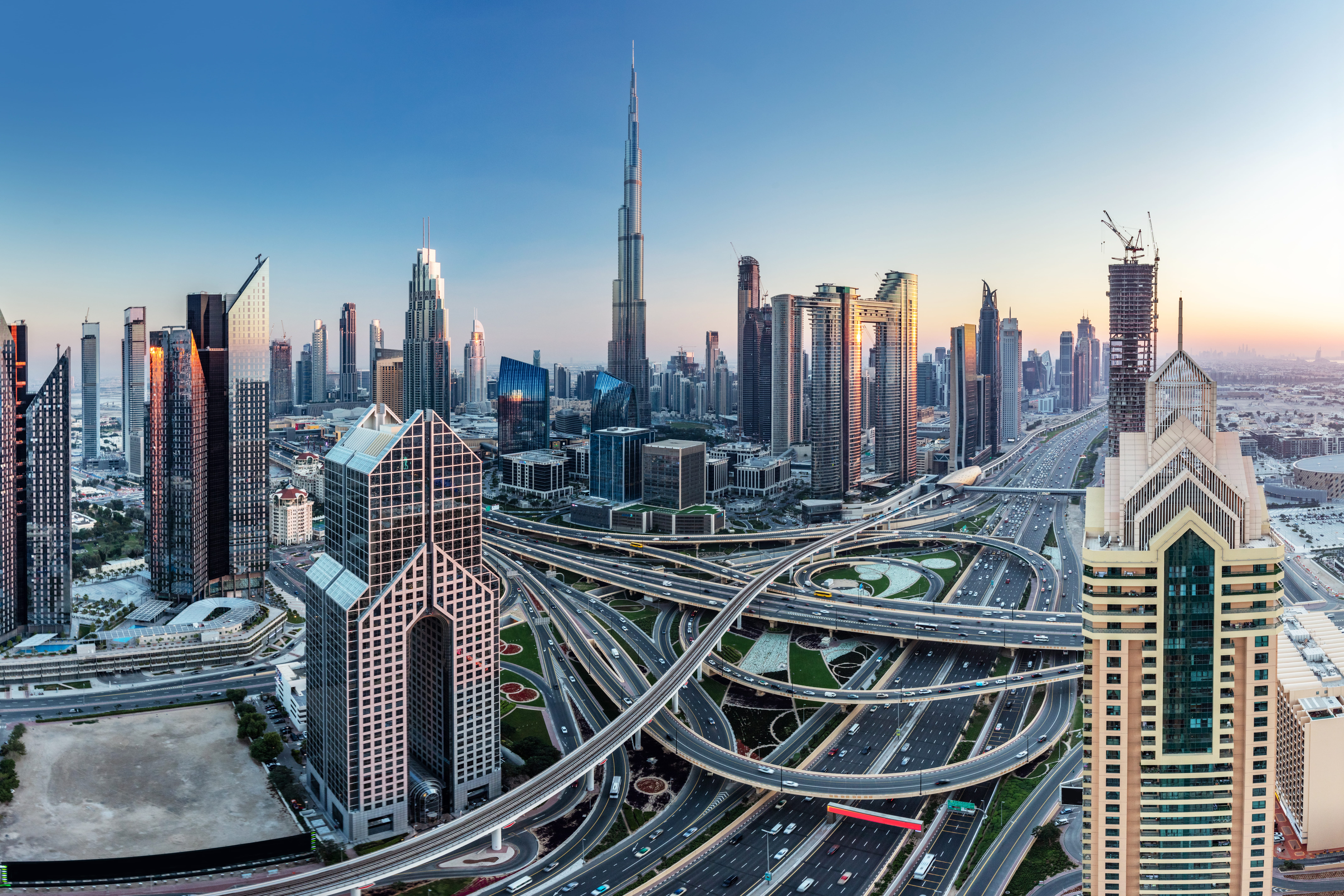 Dubai Downtown skyline with the Burj Khalifa and Sheikh Zayed Road interchange.